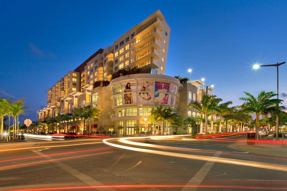 shops at midtown seen at night with light coming through windows