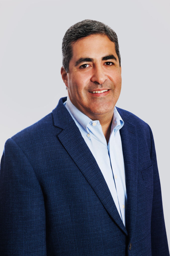 headshot of Miguel Velez project executive of Burke Construction Group